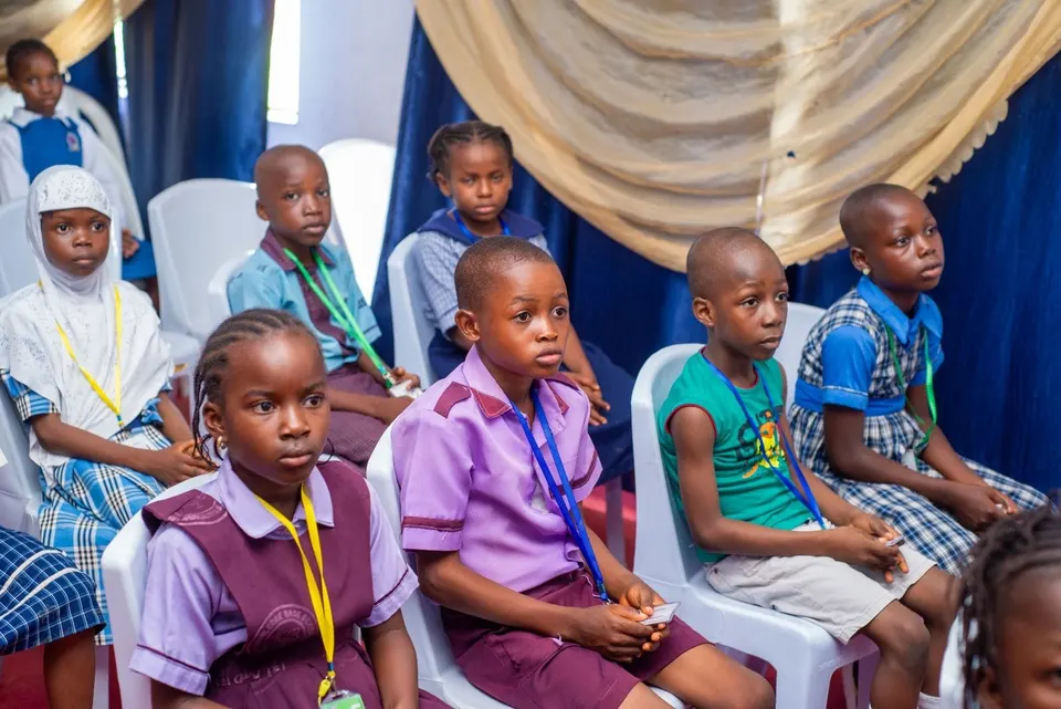 Pupils seated and waiting at the Akinyele Spelling Challenge 2026